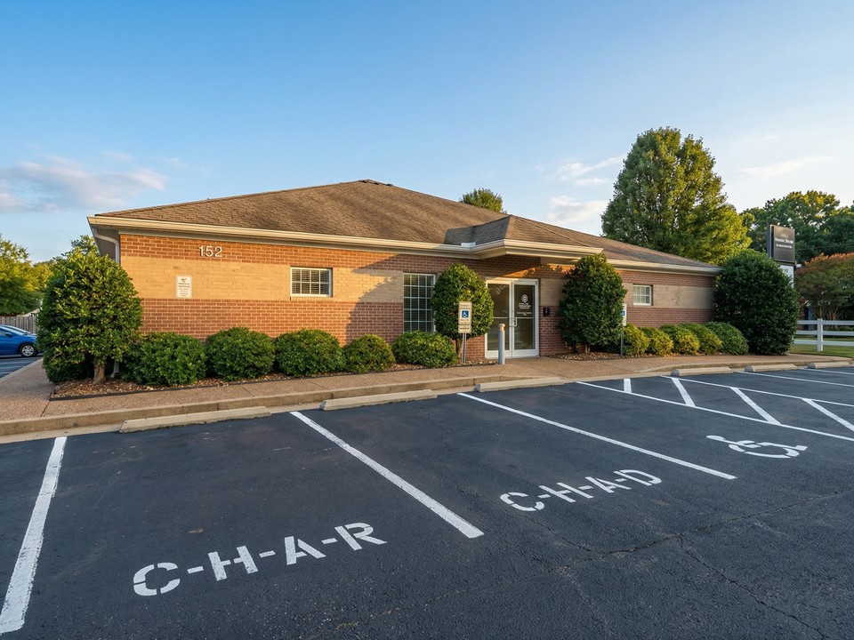 The professional exterior view shows the CareWorks ABA therapy center building located in Suffolk, Virginia.
