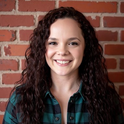 Professional headshot of Ashley Bowman, MS BCBA and Regional Clinical Director leading trauma-informed ABA care.