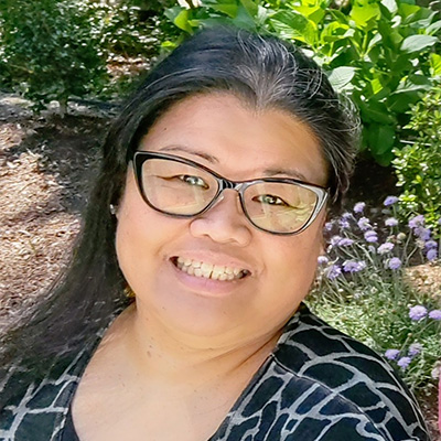 Professional headshot of Madonna Valdez, MA BCBA and Director of Educational Programming with 25+ years in special-needs education.